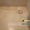 Stone-Finish Sanitex Einsatz als Duschkabinenreiniger gegen Kalkablagerungen in Duschwannen